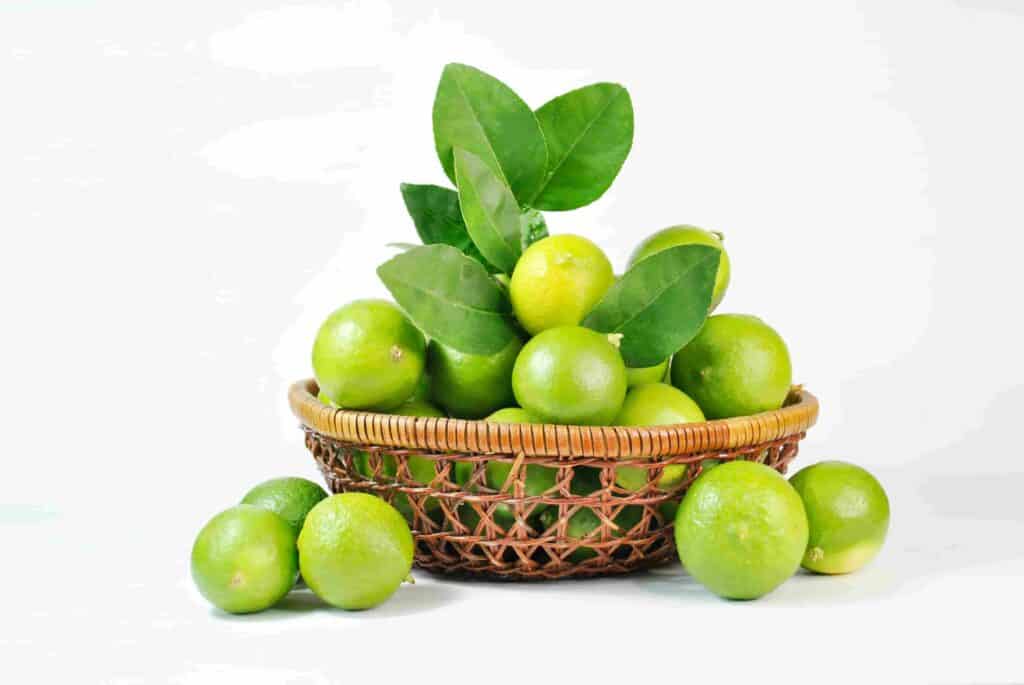 A bunch of lime on a woven basket